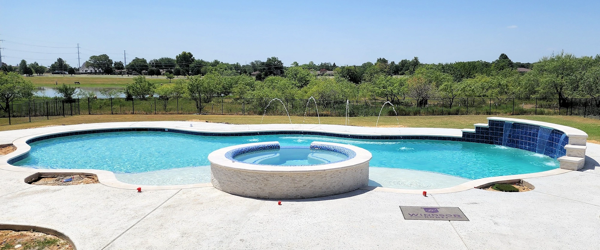 Beautiful view of a stunning backyard oasis.